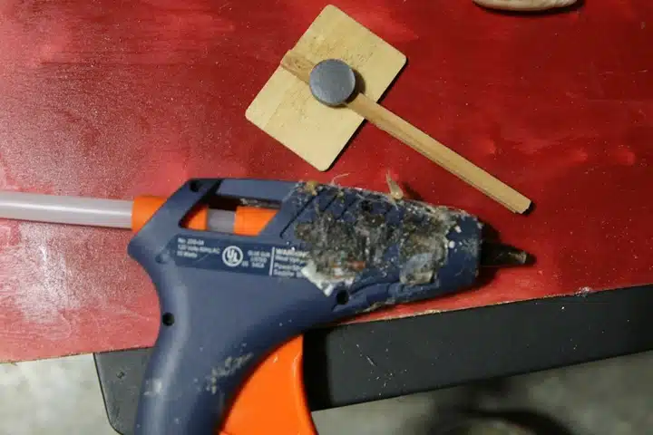 use a hot glue gun to make magnets