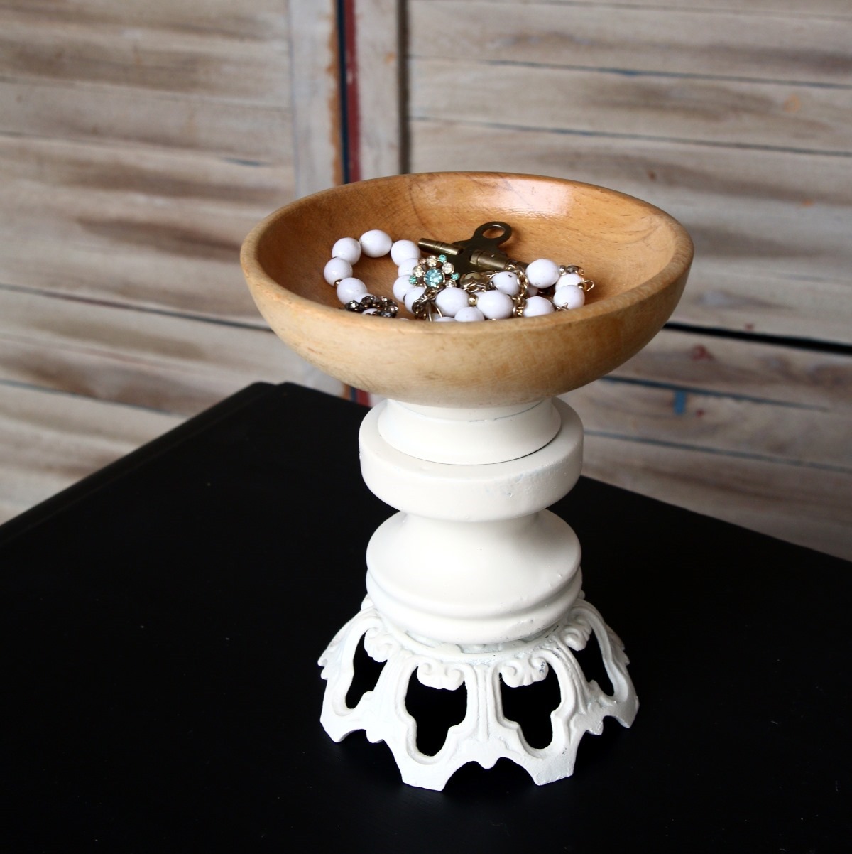 white farmhouse style candleholder made from recycled pieces spray painted white