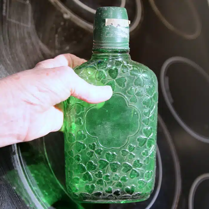 Old Clover green glass whiskey bottle
