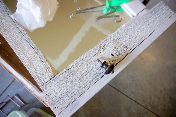 use furniture knobs to hang necklaces