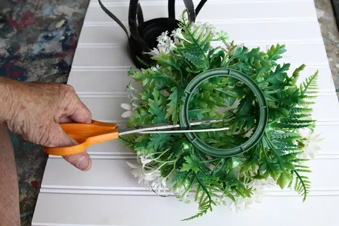 cutting a candle flower ring to fit
