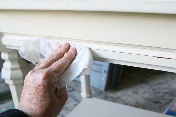 distress white paint to make it look aged