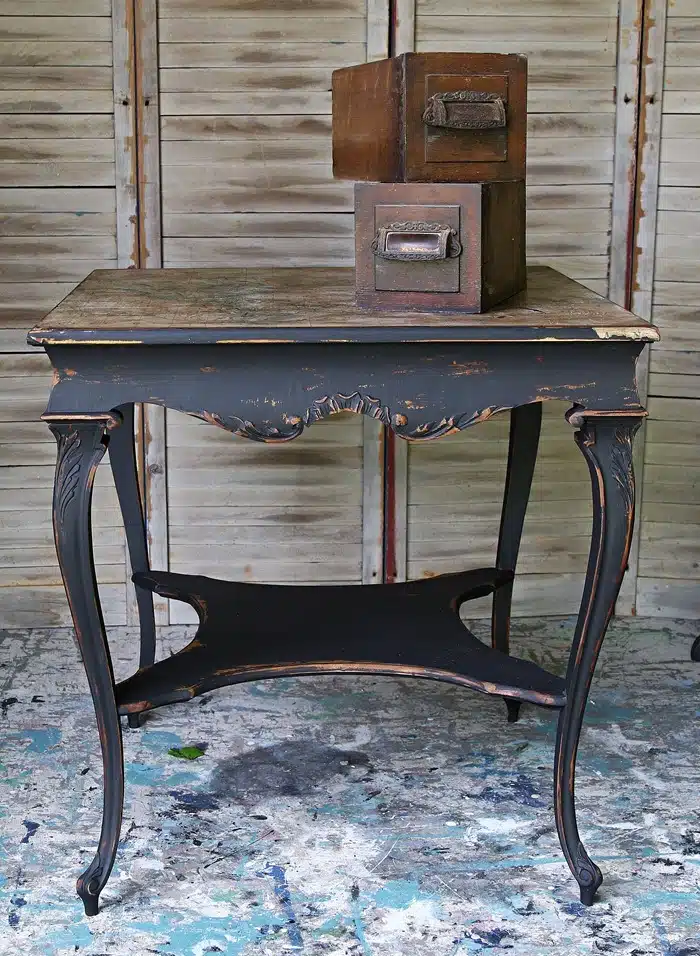black table painted with Dixie Belle paint and distressed