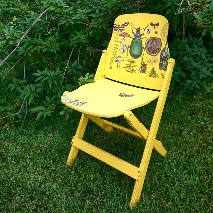 folding chair makeover with yellow paint and decor transfers