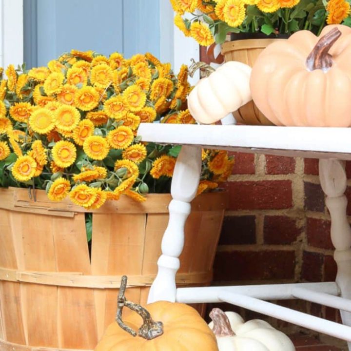 front porch with pumpkins