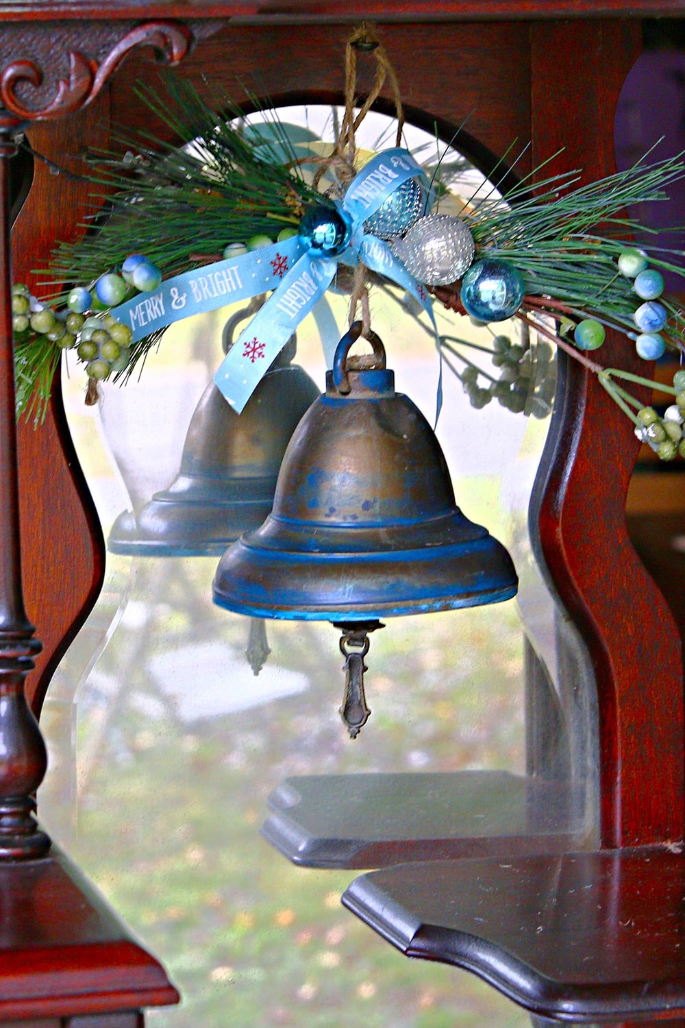 repurposed brass light fixture into a Christmas bell