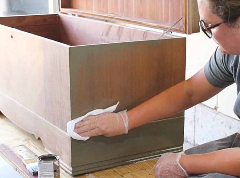 applying wood stain by A Ray Of Sunlight