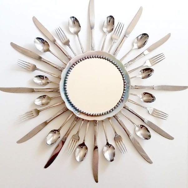 starburst mirror with silverware