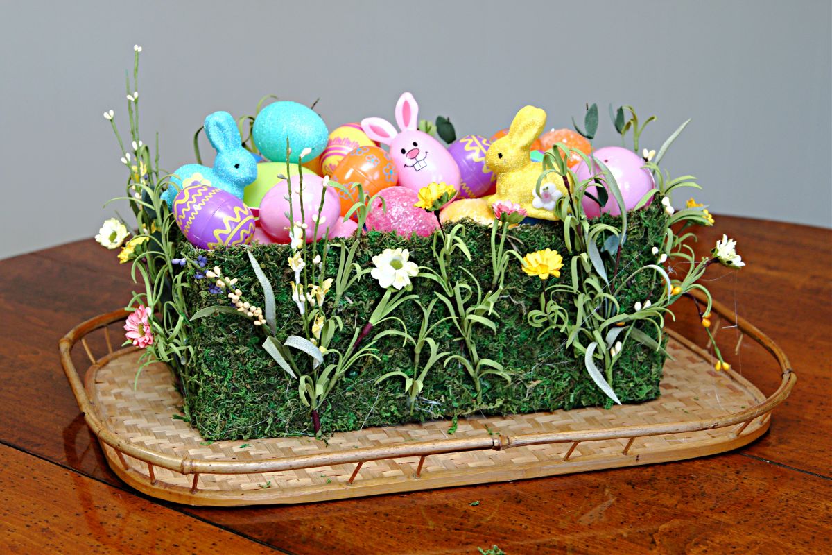 Easter display made from a repurposed shoe box and a green moss mat