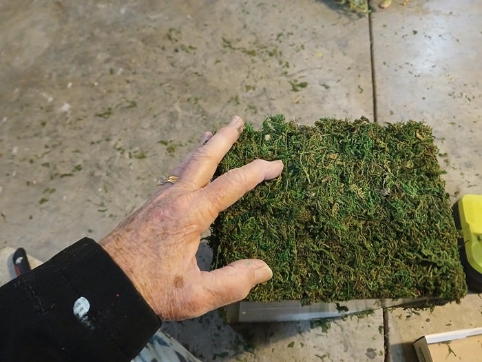 hot glue faux grass to a show box