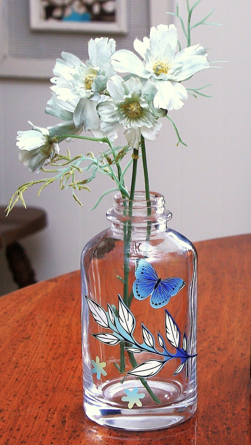 create a vase from a glass bottle by adding decals and stickers 2