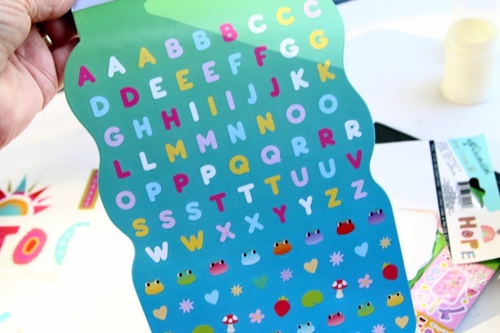 how to use Dollar Tree decals and stickers to decorate bottles and terra cotta pots (12)