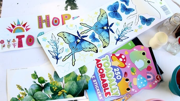 how to use Dollar Tree decals and stickers to decorate bottles and terra cotta pots (4)