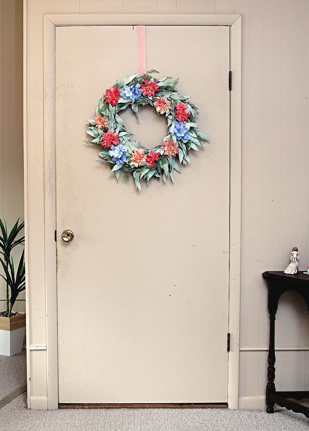 hang a wreath on an inside door for a unique look