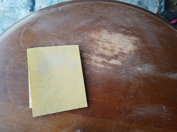 sanding scratched furniture