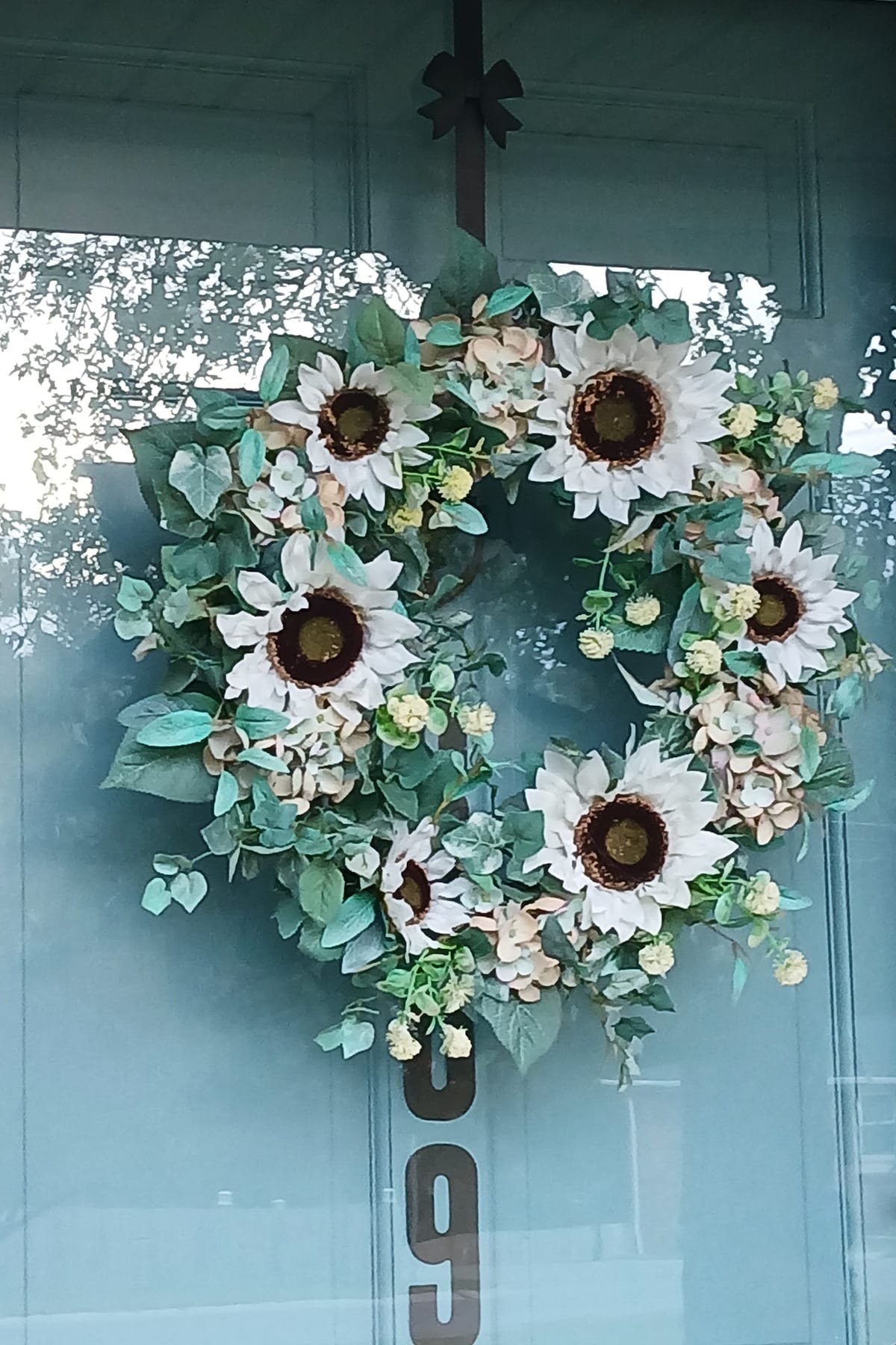 how to make a swhite unflower wreath using an old wreath base how to make a swhite unflower wreath using an old wreath base