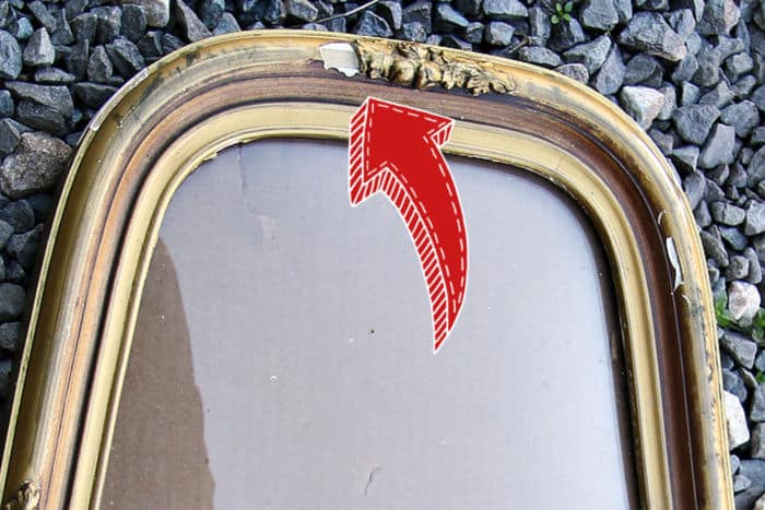 damaged wood applique on frame