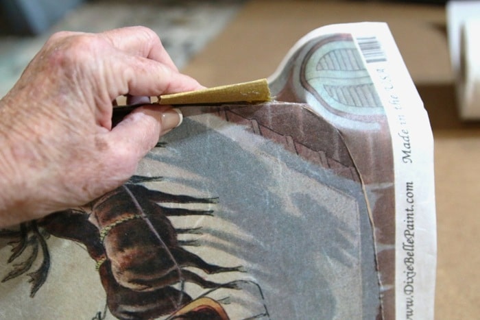 how to use sandpaper to trim decoupage paper around project