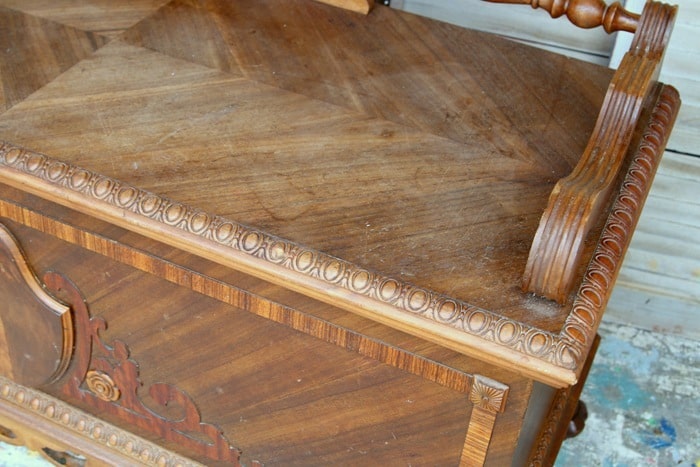 old furniture with faded stain repair
