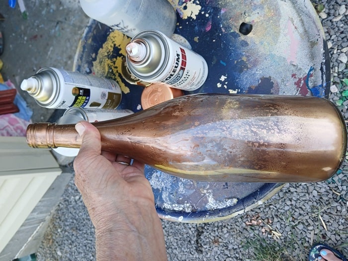how to repurpose a wine bottle with spray paint for a mercury glass finish (2)