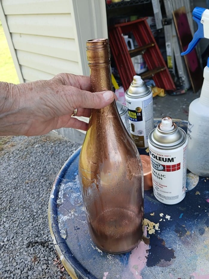 how to repurpose a wine bottle with spray paint for a mercury glass finish (5)