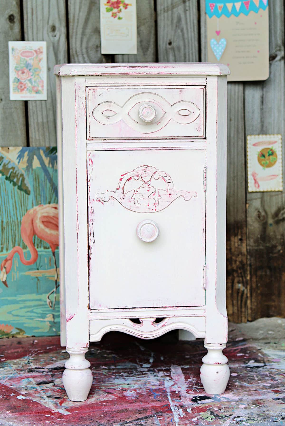 pink and white paint finish for furniture using the Vaseline petroleum jelly distressing technique for layering paint