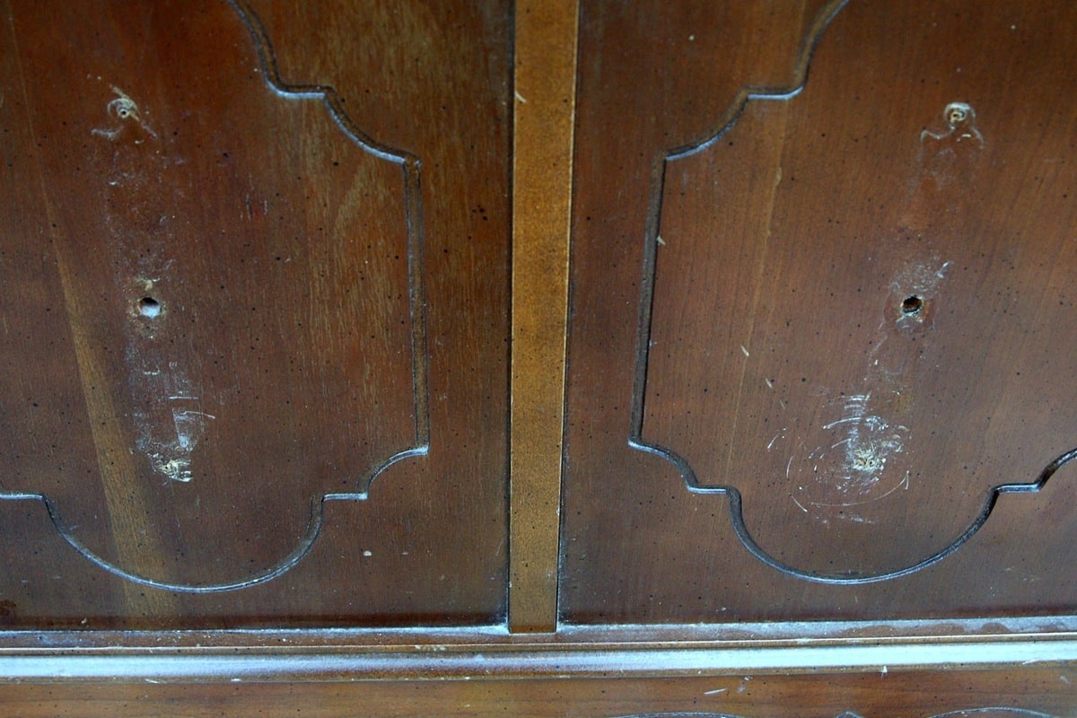 scratches on furniture where hardware was removed