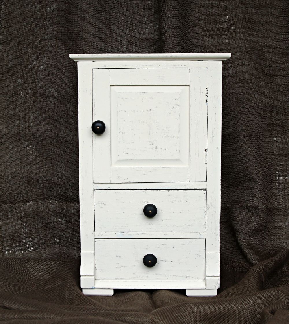 small nightstand painted white with black streaks for a modern furniture