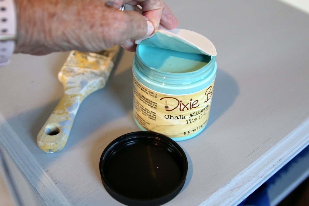 applying first coat of paint to furniture (3)