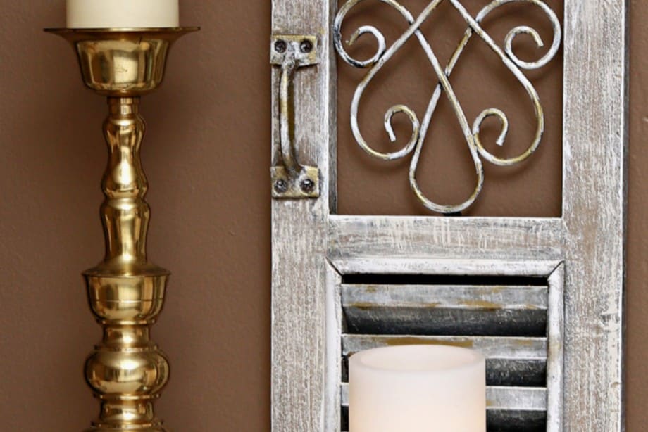 metallic accents added to a rustic wall candle holder with Dixie Belle Gilding Wax