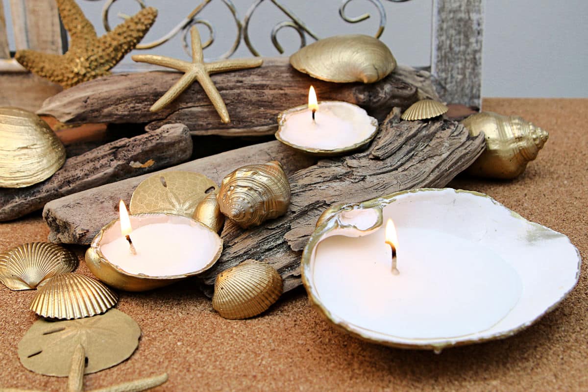 how to spray paint seashells or clamshells metallic gold and add wax to make a seashell candle