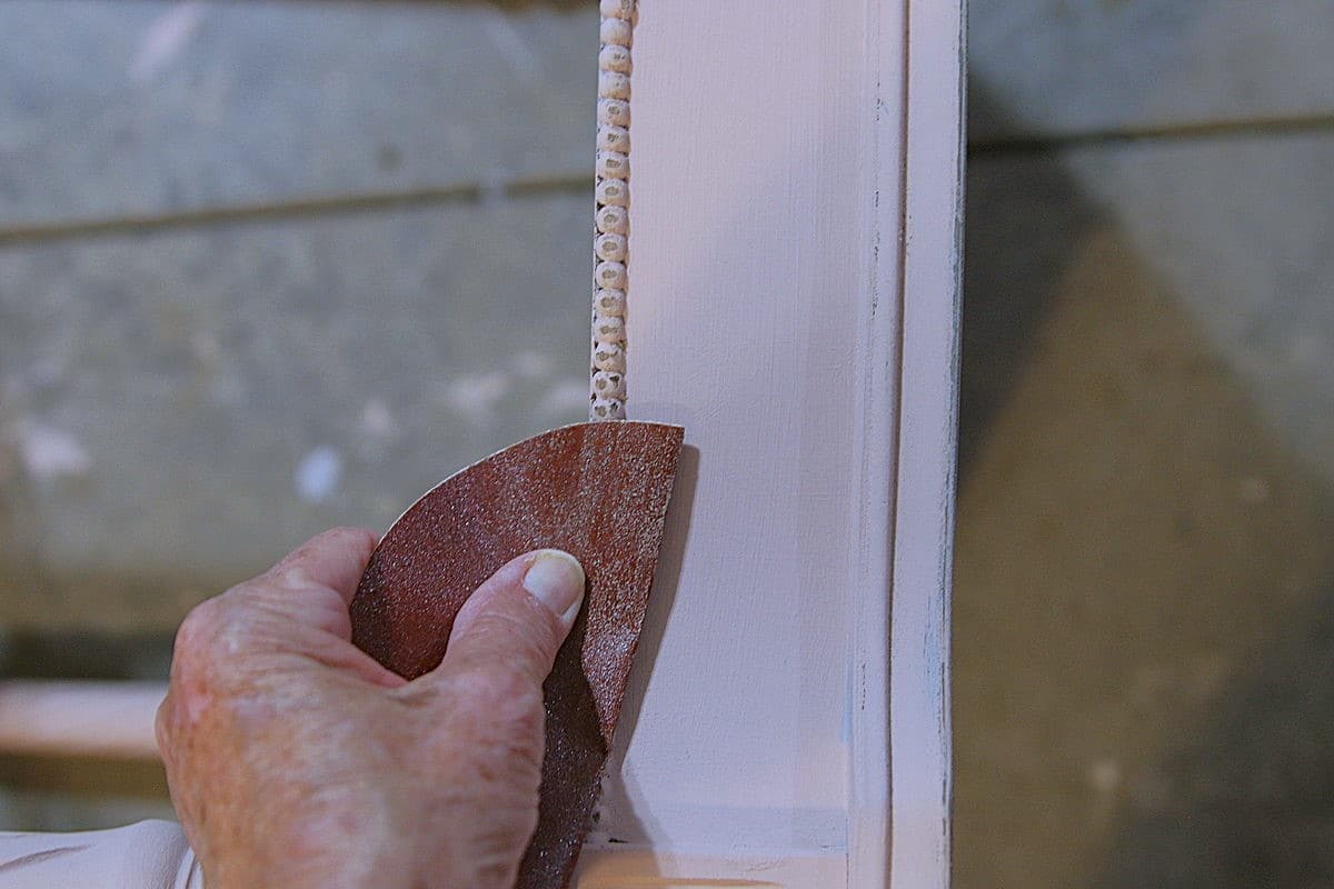 how to distress paint by hand with sandpaper