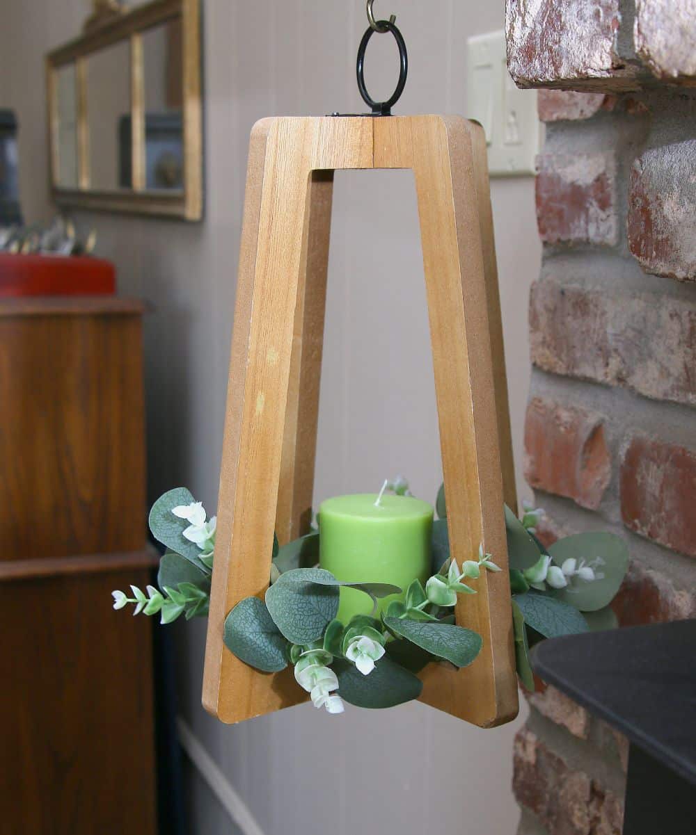 upcycled candle holder with green candle