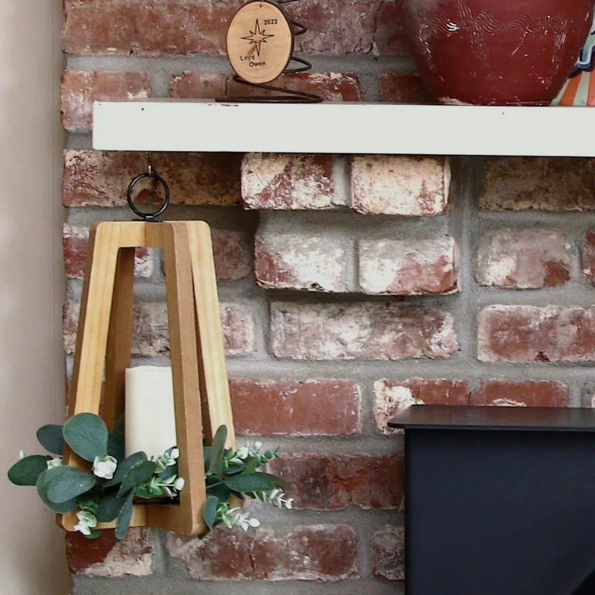 thrift store candle holder upcycle with a 50 cent wreath 1