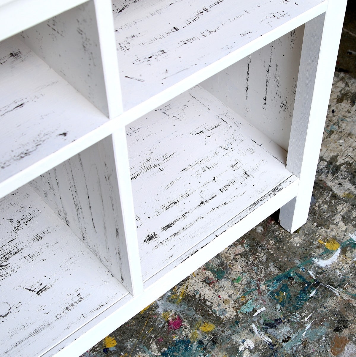 IKEA console table painted white with black distressing